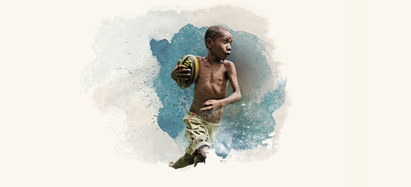 Boy running with a rugby ball, watercolour illustration